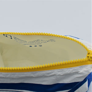 Inside view of zip pouch in Lined Up pattern in blue, white and golden yellow.