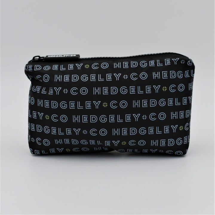 Mini zip pouch in Just Us design in black, white and a hint of yellow.