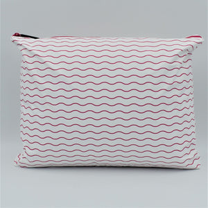 Large zip pouch in Waving pattern in hot pink and white.