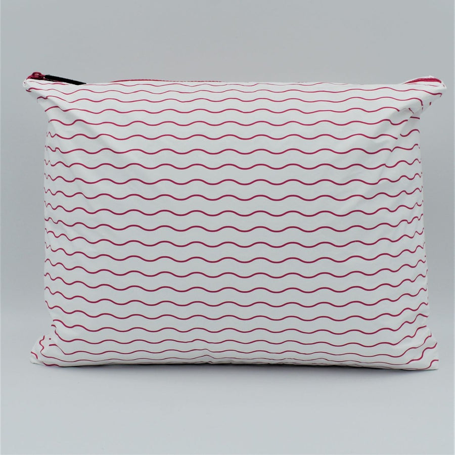 Large zip pouch in Waving pattern in hot pink and white.