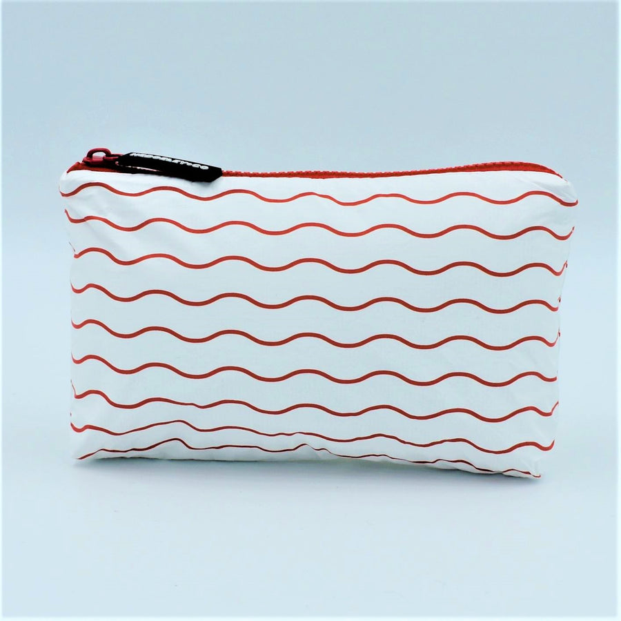 Mini zip pouch in Waving pattern in tomato red and white.